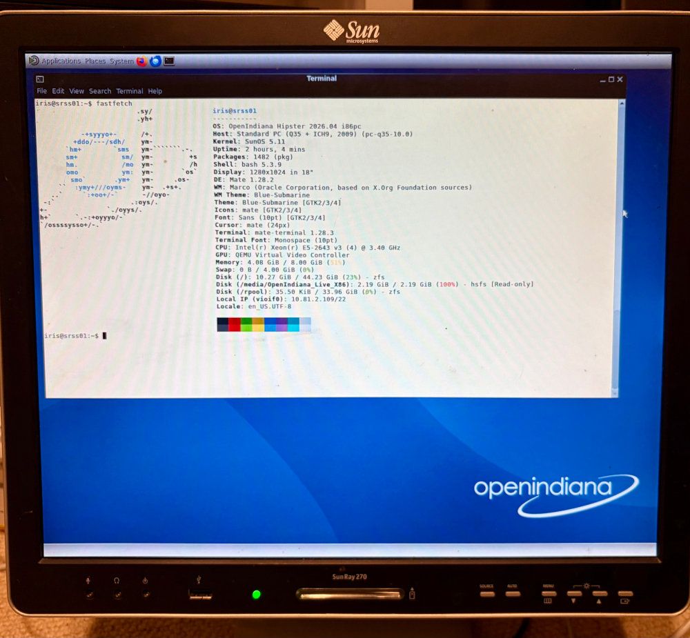 a Sun Ray 270 client showing the OpenIndiana desktop, a terminal is open showing fastfetch output